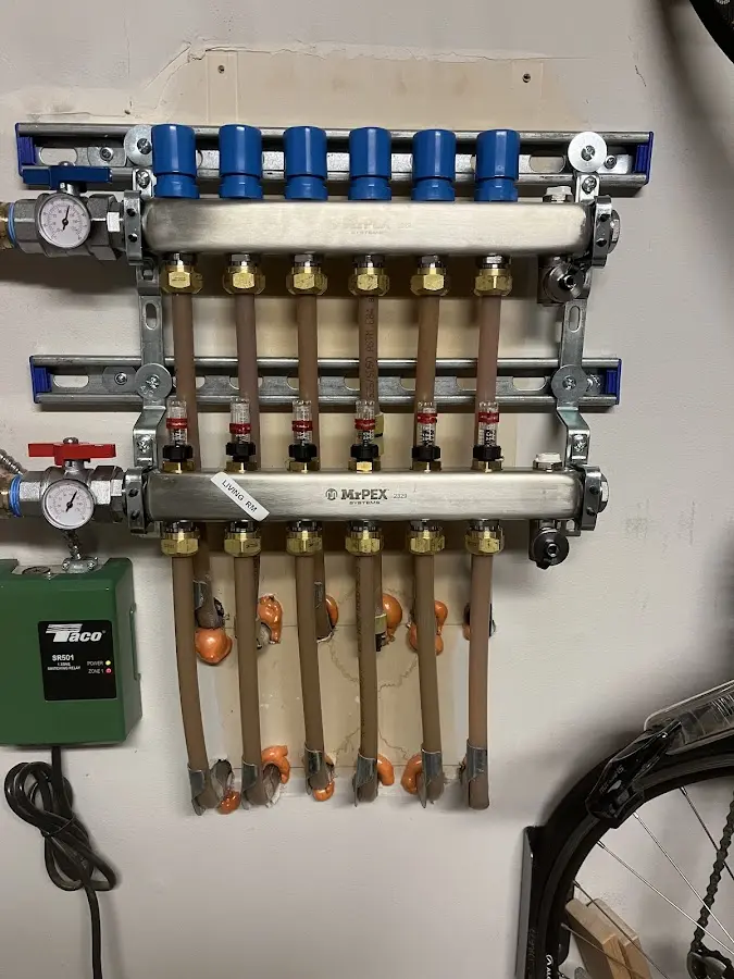 Plumber performing Water Heater Repair at a residential property in Auburn Hills